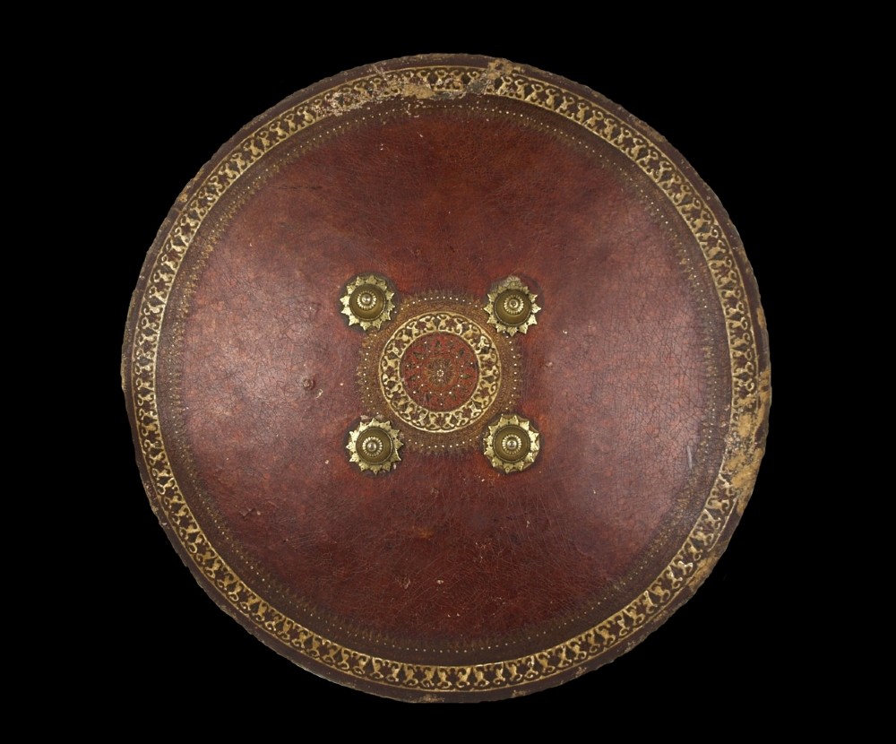 a large 19th century indian polychrome finished hide shield dhal ahmedabad gujarat c 1850
