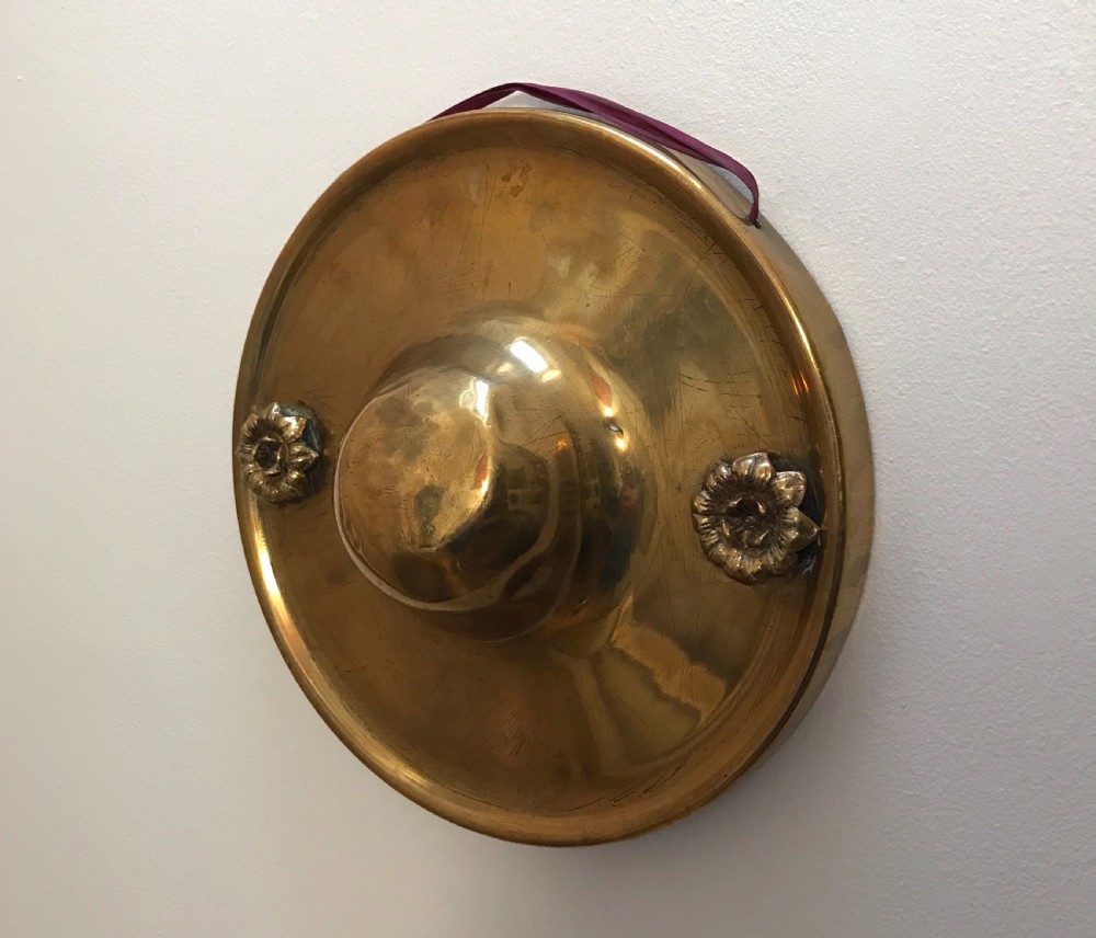 a 19th century mughal wrought brass gong cast embellishments