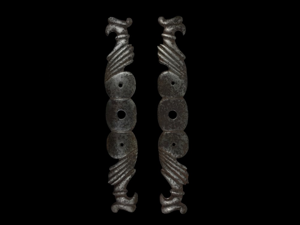 a scarce pair of wrought steel armoire door plates french mid 17th century